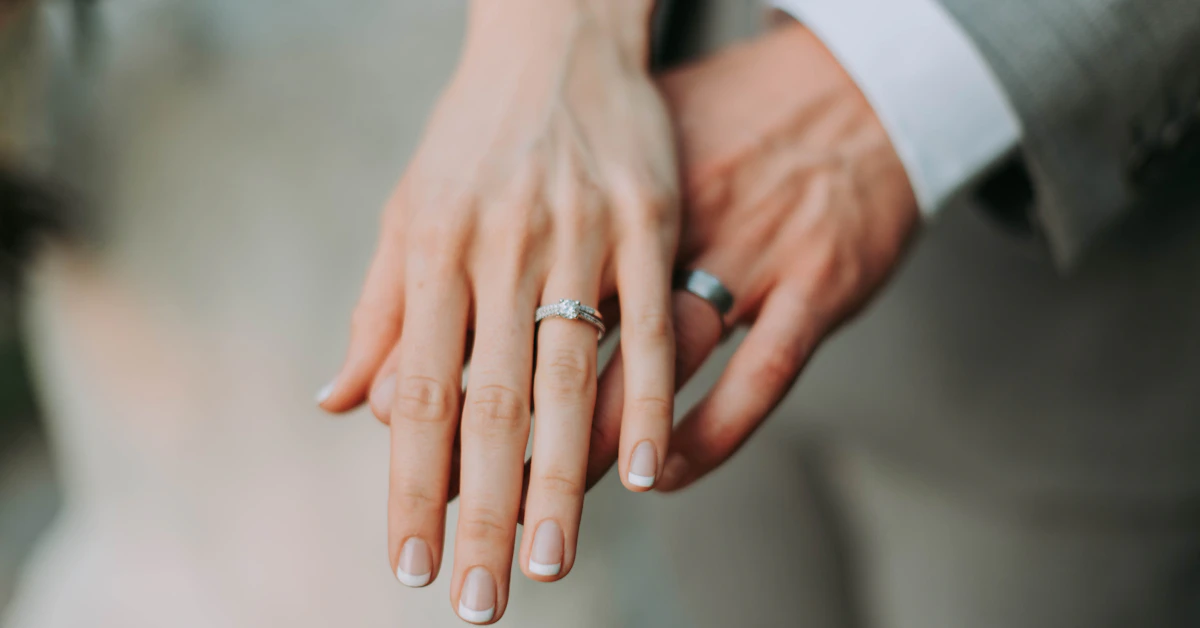 woman touch man's hand